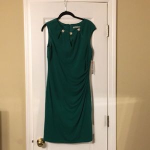 Brand new green cocktail dress. Never worn